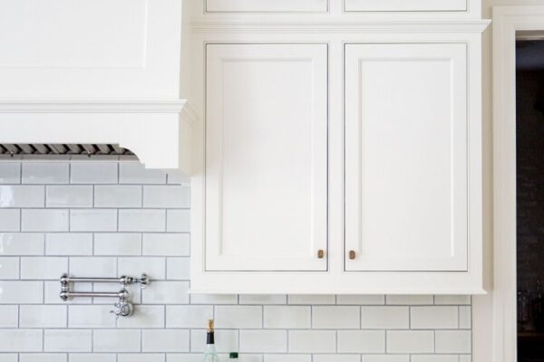 The cabinets for your kitchen should work hard but also provide a little joy—like being able to see your favorite dishes you bought abroad each time you enter the room.