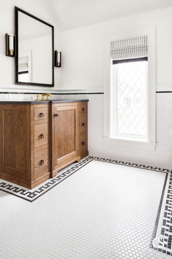 This custom flooring does wonders in helping some of our best custom bathroom cabinet designs feel like they've always belonged in the space.