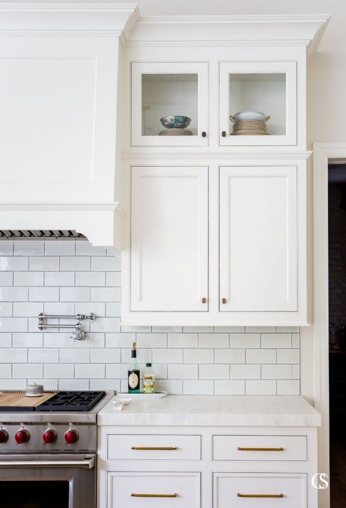 The cabinets for your kitchen should work hard but also provide a little joy—like being able to see your favorite dishes you bought abroad each time you enter the room.