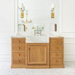 The many design ideas for this cabinet included a marble front sink extending from the countertop to really make a statement.