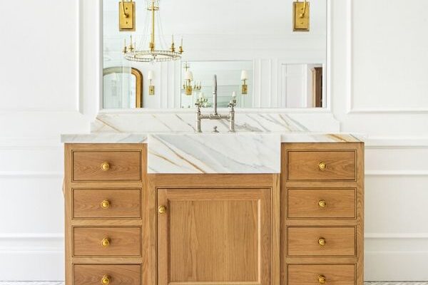 The many design ideas for this cabinet included a marble front sink extending from the countertop to really make a statement.