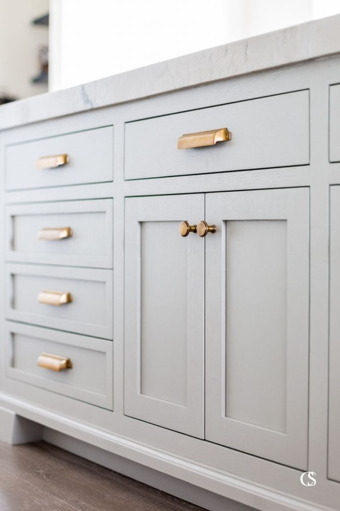 Has there ever been a more swoon-worthy custom cabinet design? These inset cabinets and their stunning hardware are what kitchen cabinet dreams are made of.