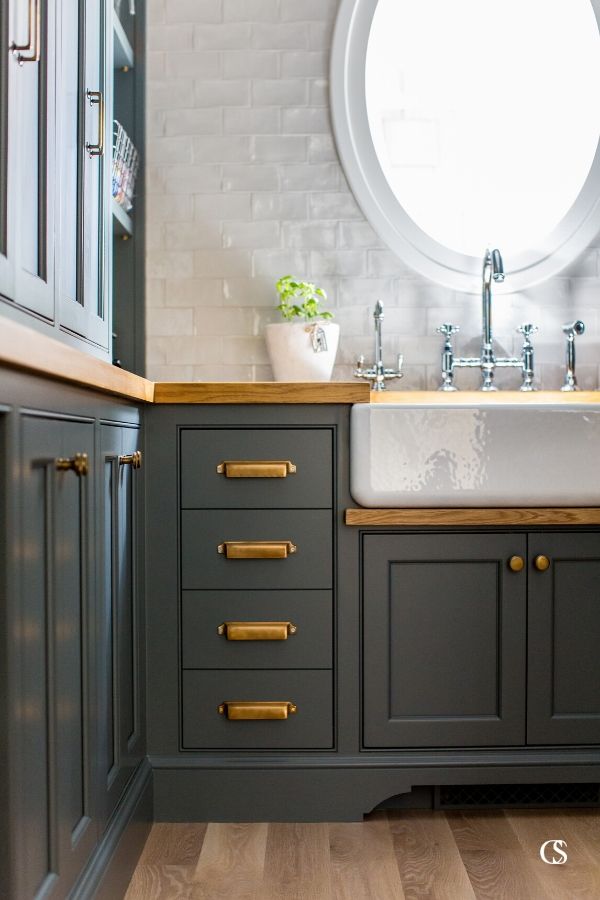 Even though Down Pipe—one of the best blue paints for interior cabinets—is technically a grey, greys tend to present with either blue or brown undertones, which is crucial to paint color consideration and complementing features in a room.