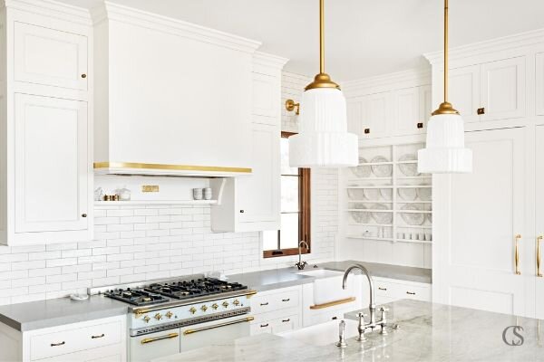Swiss Coffee by Benjamin Moore is one of the best white cabinet paints on the market. It adds a touch of refined warmth to any kitchen.