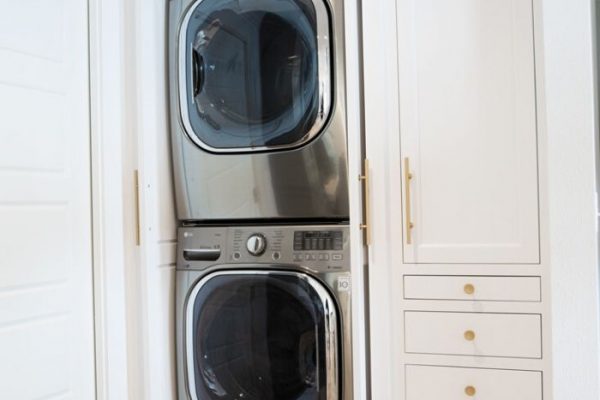 Who wouldn't want hideaway cabinets for their laundry? Especially if your washer and dryer don't have their own room!