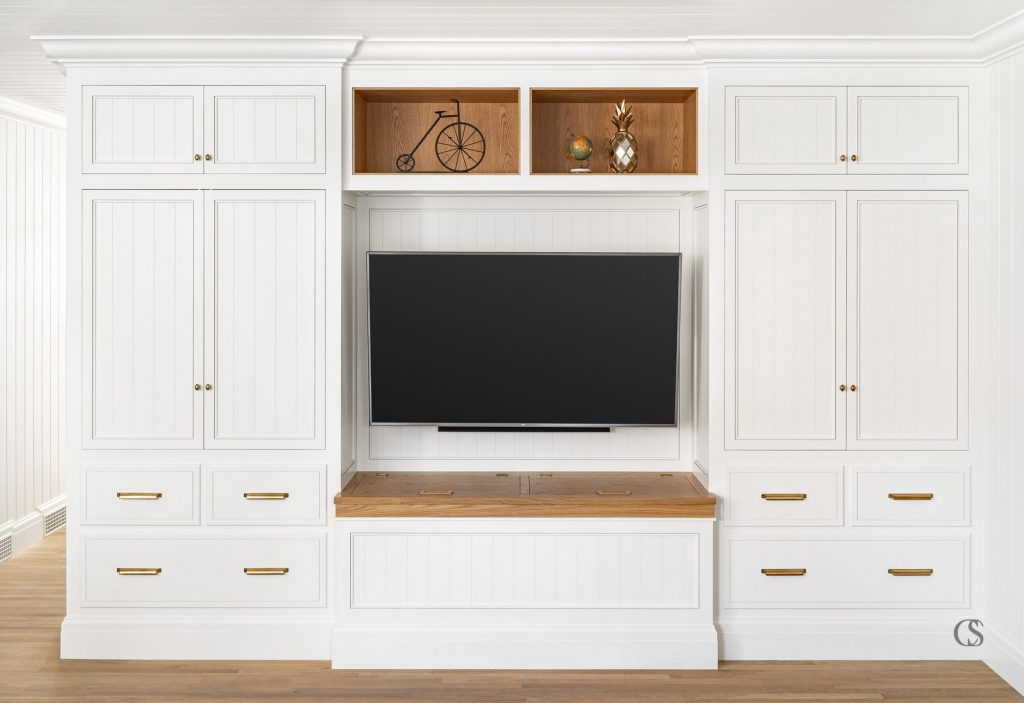 Those contrasting display shelves make this one of our most unique entertainment center ideas—you'd never find this meticulously designed piece at the store.