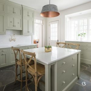 Have you ever thought about creating a specified study nook for the kids in your home? This custom island design off the mudroom makes the perfect homework station.