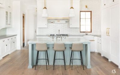 Love the idea white paint for your kitchen cabinets but want to add a pop of color? A custom kitchen island is the perfect place to bring a little color to your white space!