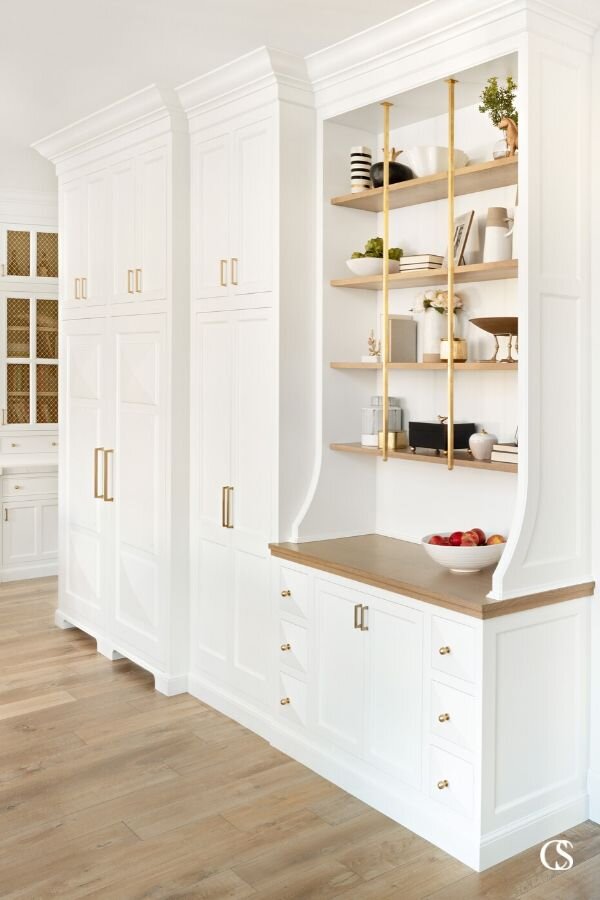 Choosing white paint for the cabinets in your kitchen? I suggest Simply White by Benjamin Moore. Find out why at ChristopherScottCabinetry.com!