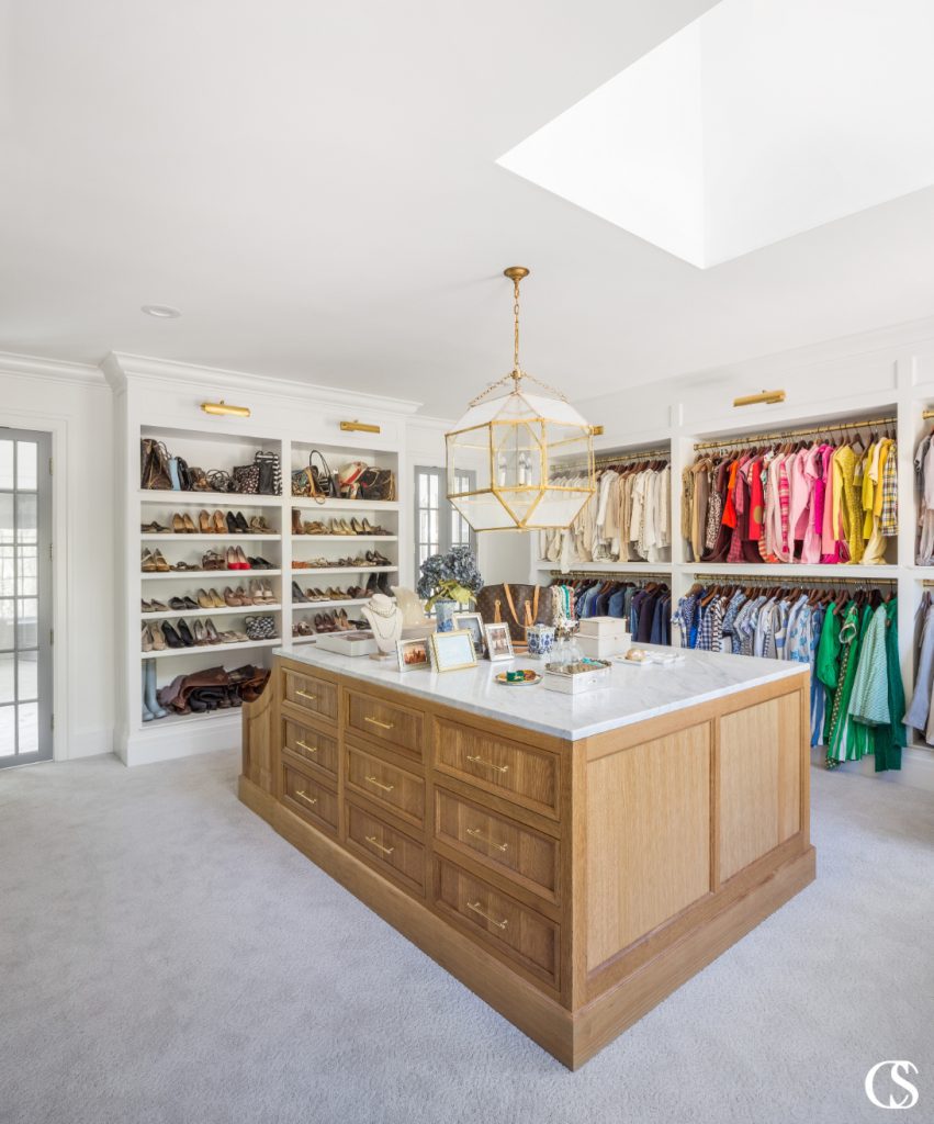 The custom closet island is a workhorse in the same way a kitchen island is. It stores, organizes, and even acts as something of a work surface (think folding laundry, grouping outfits as you pack, etc.).