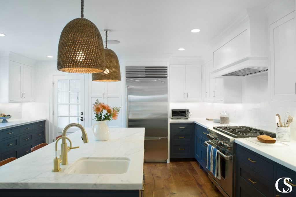 This oven range hood is a perfect example of form + function. While the surrounding cabinetry is shallower than the oven, the range hood still needed to be big enough to work effectively.