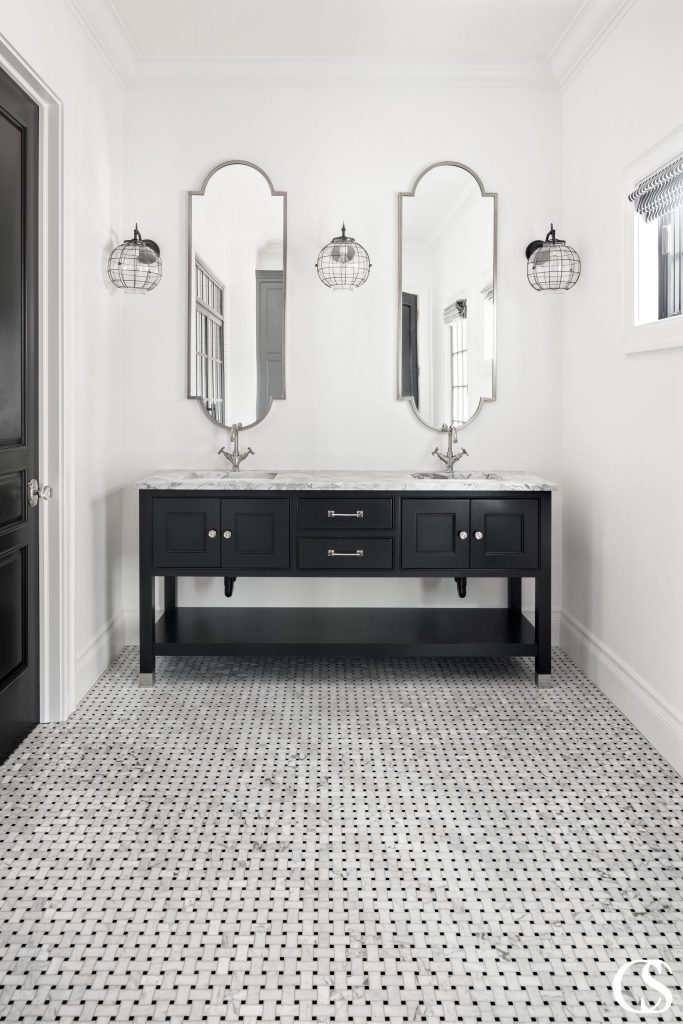Black and white is one of the most popular paint color combinations for the bathroom for its timeless elegance