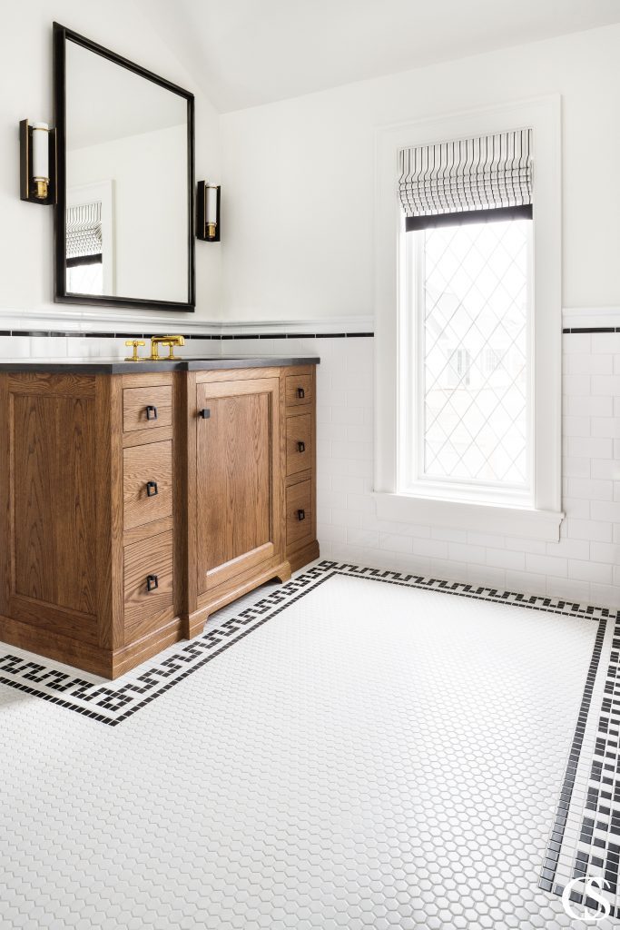 This custom flooring does wonders in helping some of our best custom bathroom cabinet designs feel like they've always belonged in the space.