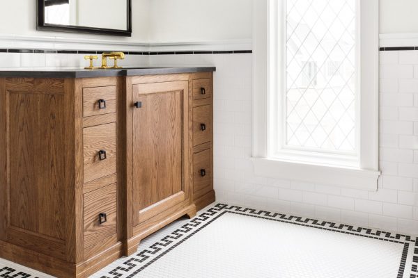 This custom flooring does wonders in helping some of our best custom bathroom cabinet designs feel like they've always belonged in the space.