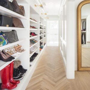 There is no shame in having a shoe collection to rival a department store's. Even less shame in putting them on display in the best custom built-ins.