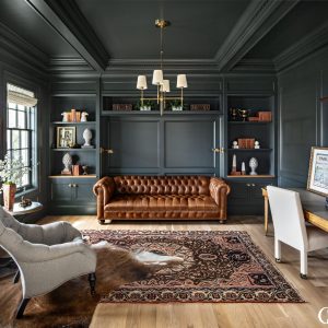 There should be no questioning why this is one of our favorite green paint colors. It's deep, moody, and adds just the right amount of earthiness for the leather and wood to pop off in this custom home office.