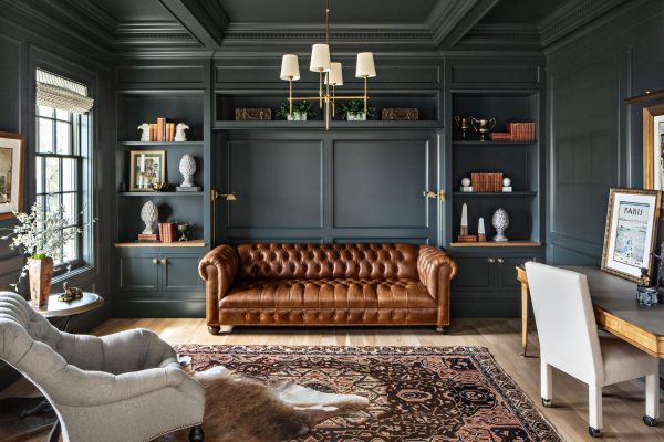 There should be no questioning why this is one of our favorite green paint colors. It's deep, moody, and adds just the right amount of earthiness for the leather and wood to pop off in this custom home office.