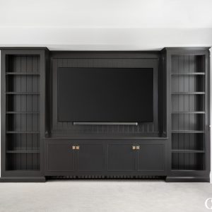 When you begin looking for entertainment center ideas it is important to consider how you and your family will be using the space and what items you’ll need to store. Is this a gathering room that will need to accommodate a variety of activities such as high-tech gaming along with low-tech gaming (board games)? Do you have a large collection of DVDs or collectible vinyl albums to store? Would you like to incorporate lighting into the display areas? These are just a few of the questions for you to consider when creating the best custom entertainment center.