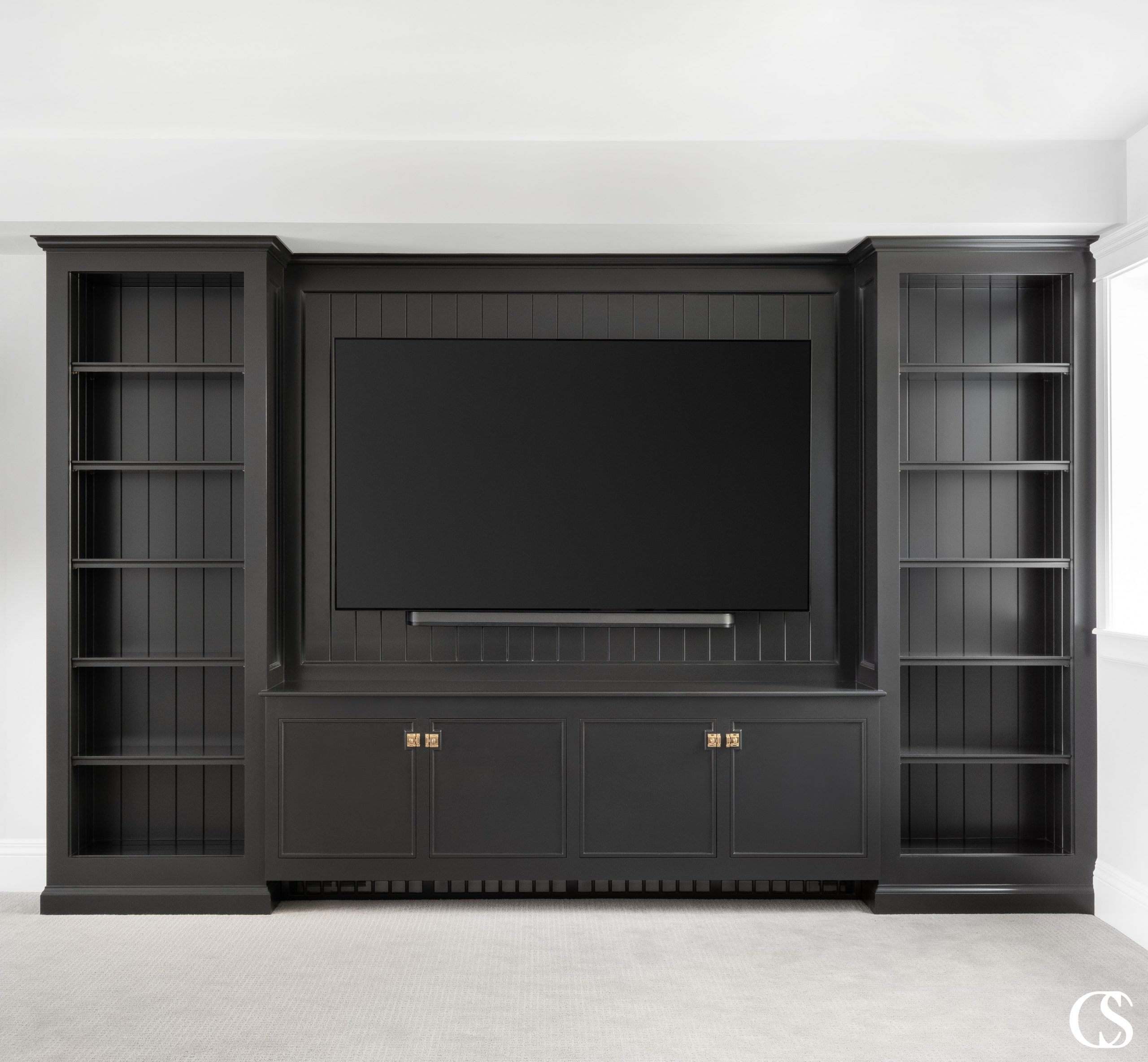 When you begin looking for entertainment center ideas it is important to consider how you and your family will be using the space and what items you’ll need to store. Is this a gathering room that will need to accommodate a variety of activities such as high-tech gaming along with low-tech gaming (board games)? Do you have a large collection of DVDs or collectible vinyl albums to store? Would you like to incorporate lighting into the display areas? These are just a few of the questions for you to consider when creating the best custom entertainment center.