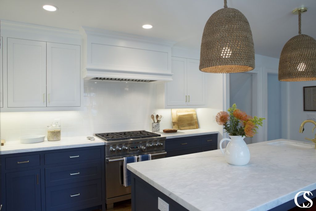 Why not pair blue and white to create truly unique custom cabinets? This color combo is a classic but still makes the space feel bright, balanced, and FRESH.