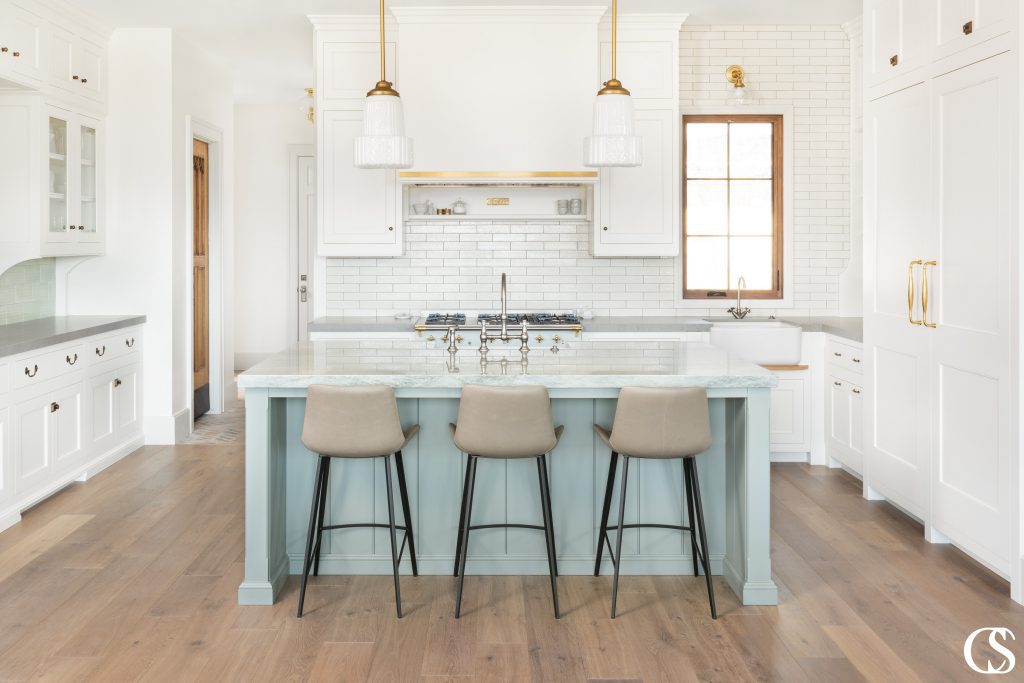 Why not add a splash of color to your custom kitchen cabinets? This pale blue makes this custom kitchen even more unique!