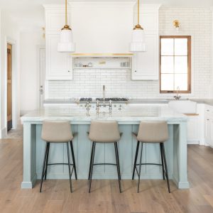 Why not add a splash of color to your custom kitchen cabinets? This pale blue makes this custom kitchen even more unique!