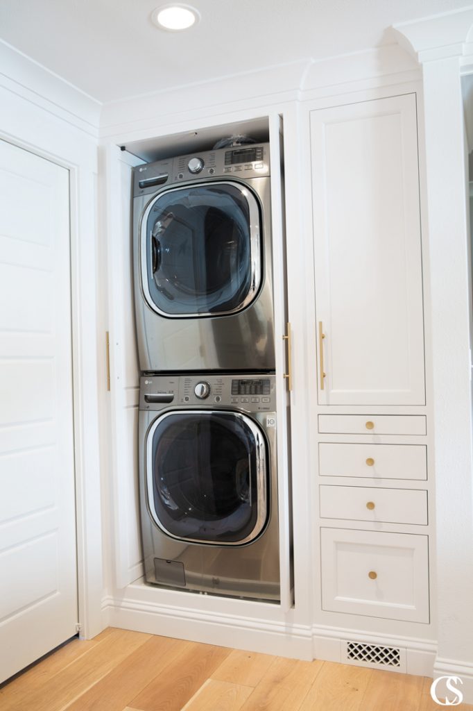 Who wouldn't want hideaway cabinets for their laundry? Especially if your washer and dryer don't have their own room!