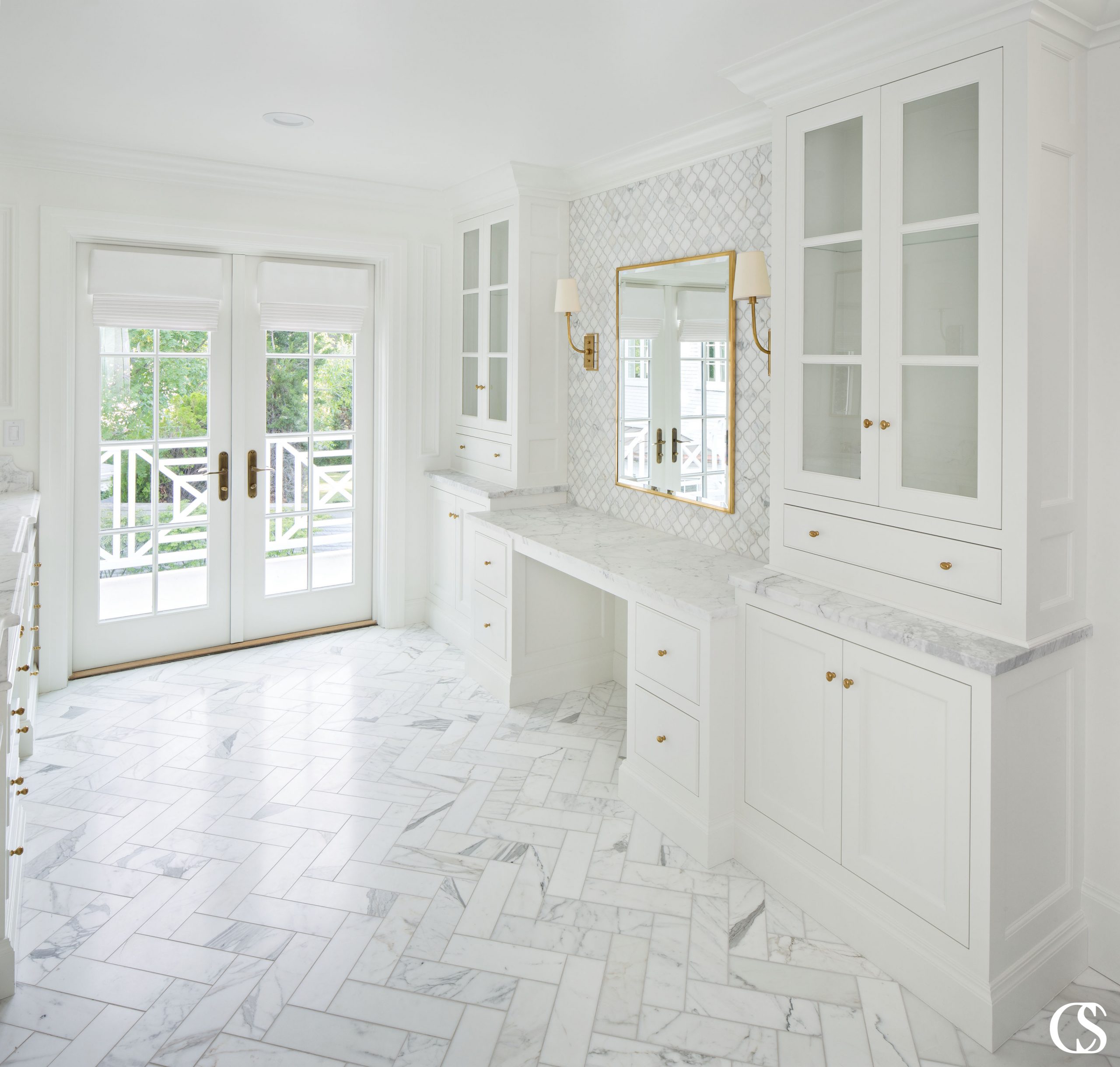 Every angle of this custom bathroom cabinet design is meticulously thought out—like putting the vanity where you can receive the best natural light while getting ready.