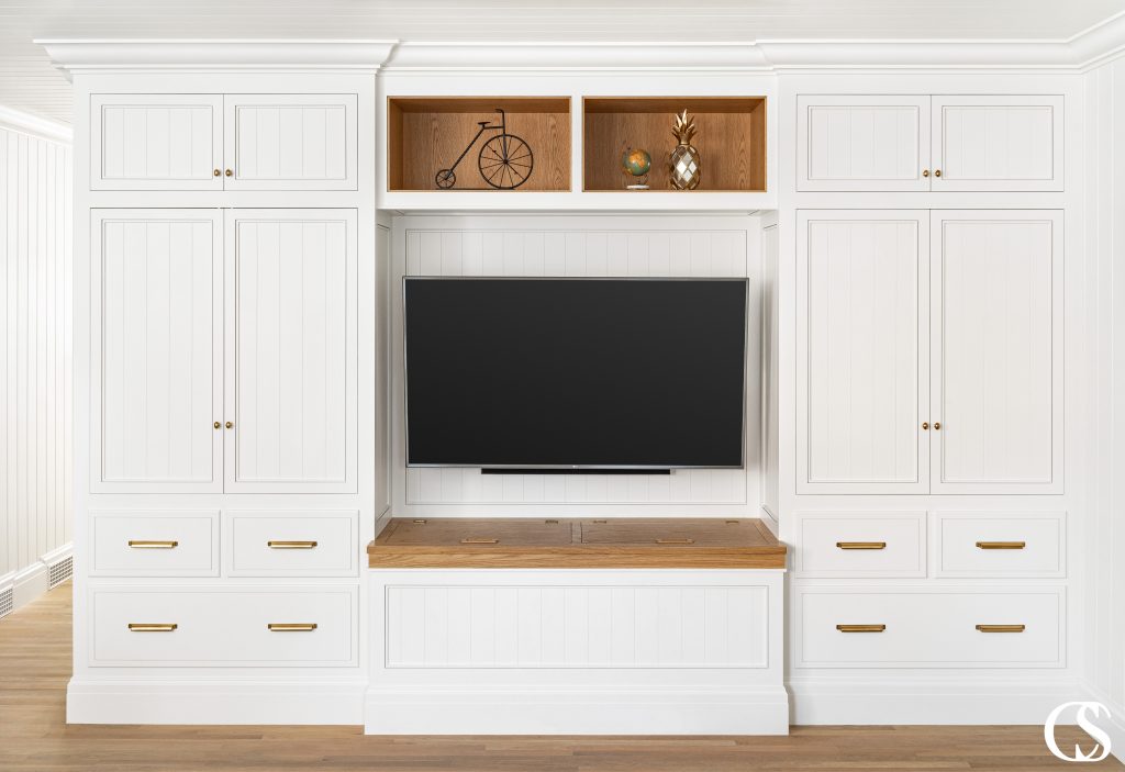 Those contrasting display shelves make this one of our most unique entertainment center ideas—you'd never find a custom cabinet design like this at the store.