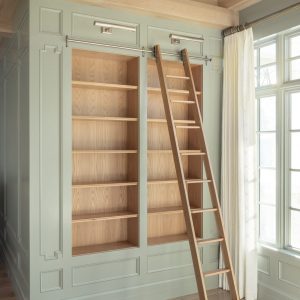 Custom cabinets for your office space can mean the creation of your own personal library, complete with rolling ladder to reach the highest tomes.