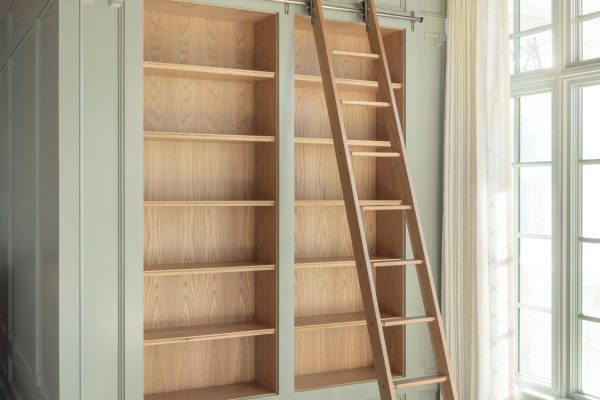 Custom cabinets for your office space can mean the creation of your own personal library, complete with rolling ladder to reach the highest tomes.