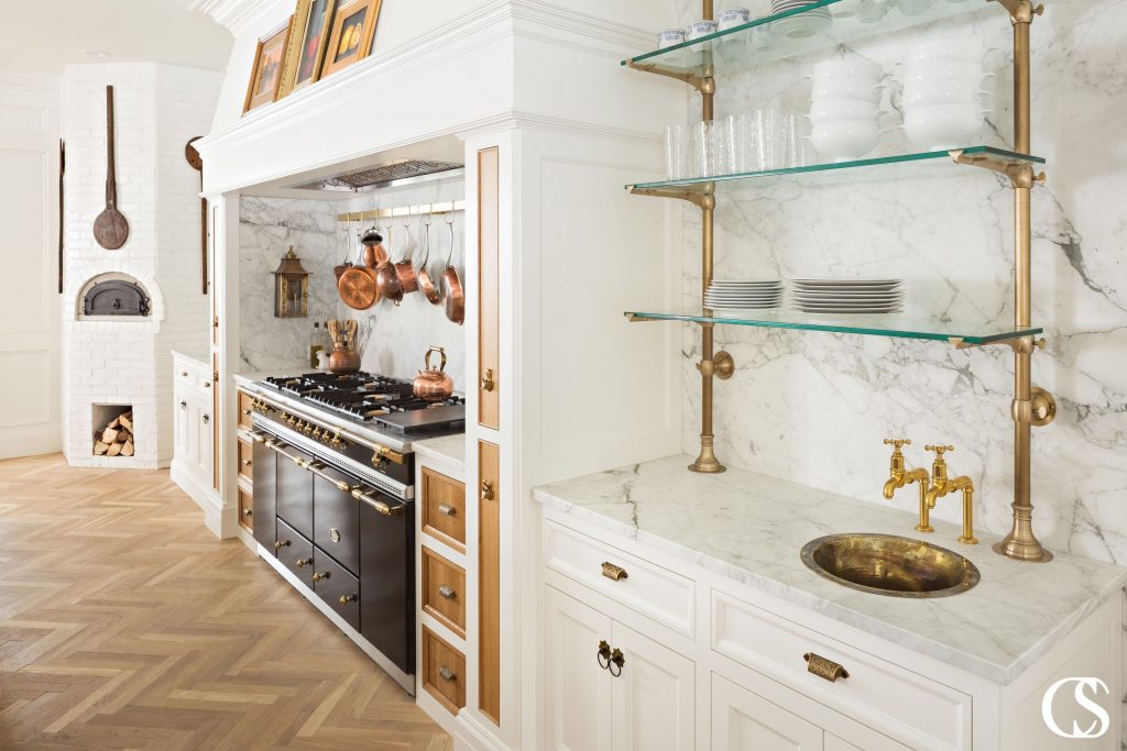 Custom kitchens are all as unique as their homeowners. Want airy, glass open shelving? How about a touch of heat from your own brick pizza oven? Add in warm copper accents and cabinet fronts and you've got yourself a truly unique and incredibly usable kitchen.