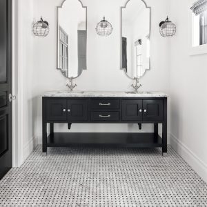 Don't sell your guest bathroom short! Even smaller spaces can accommodate custom two sink bathroom designs.