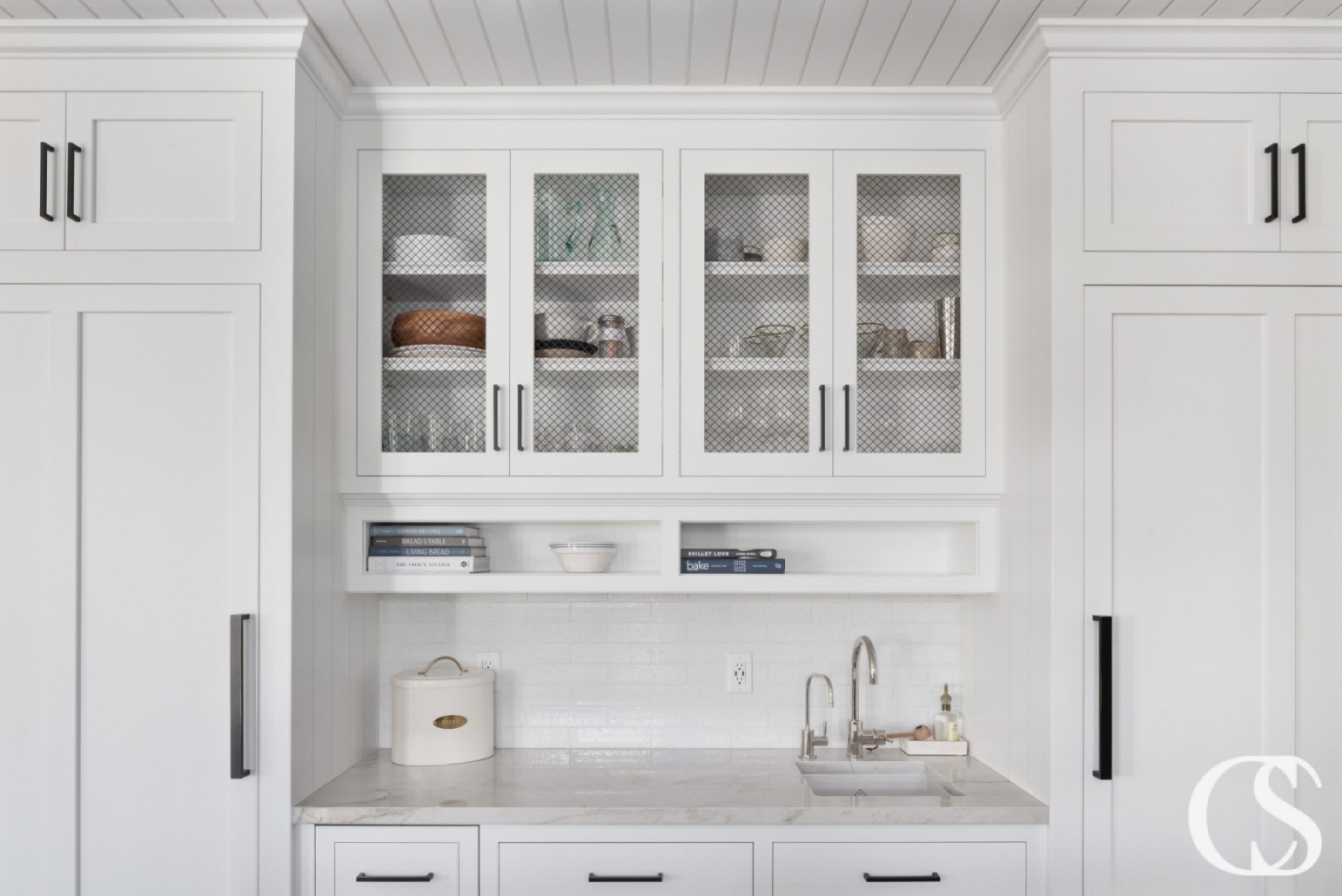 Custom white kitchen cabinets designed to fit seamlessly into any kitchen design, featuring premium materials and ample storage space for a functional and stylish look.