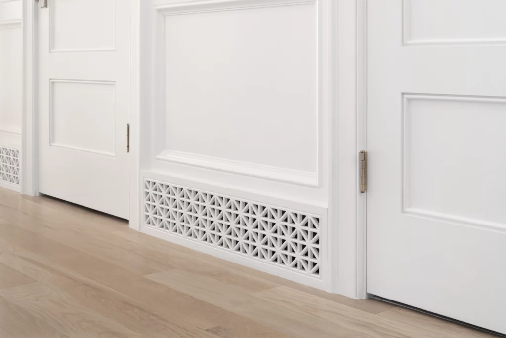 Vents for a custom home can make areas you’d normally want to draw the eye away from new areas of interest and beauty