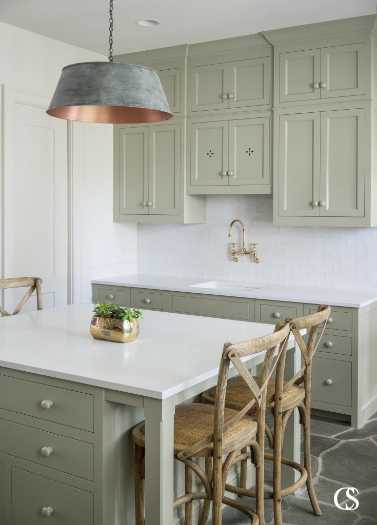 Pastel, muted, even lighter grey-toned greens are good choices for cabinet colors—think sage or mint. They can still make a statement, but will also have longevity in your home. This is one of our favorite green paints for the kitchen!