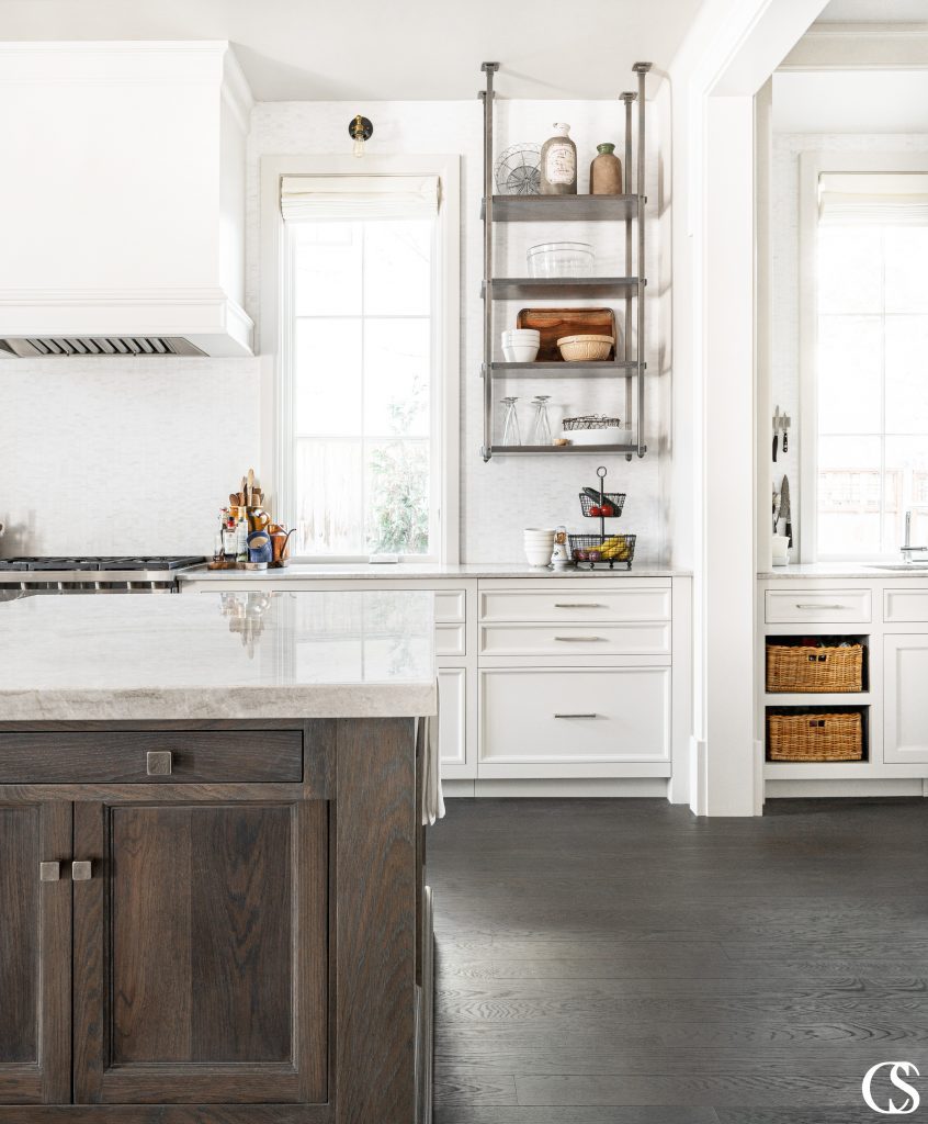 A custom oven hood—also known as a custom range hood cover—can play multiple important roles at the center of your kitchen.