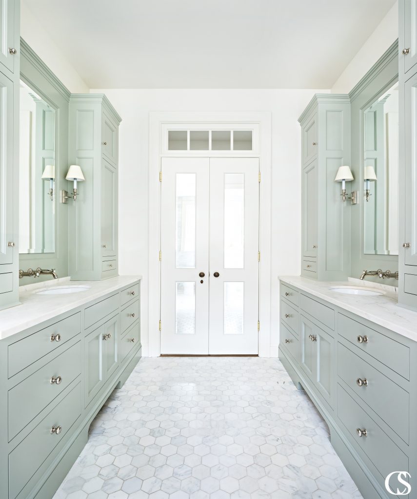 A common misconception with bathroom vanity cabinets is that a vanity is all one cabinet. But you can see with this unique bathroom cabinet design and color, a vanity can be almost any configuration that fits your space and needs.