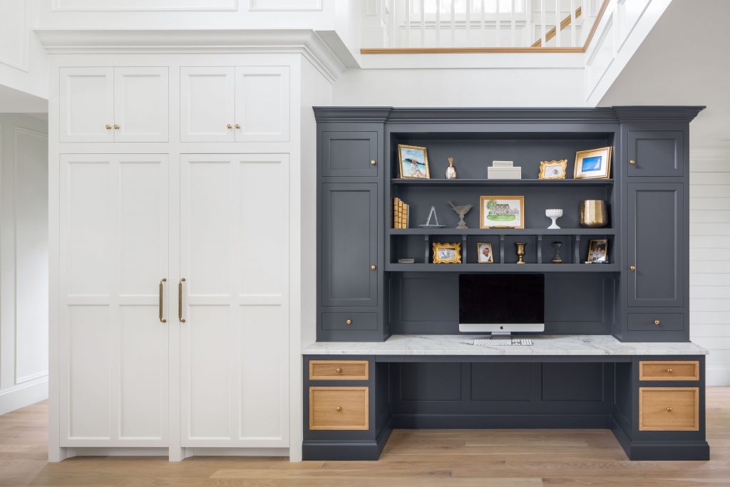 If your floor plan doesn’t allow for a completely separate office, many other spaces in the home lend themselves to becoming a built-in desk nook. This way, the unique built in desk takes advantage of a smaller existing space, often near the kitchen or just off the main living room.