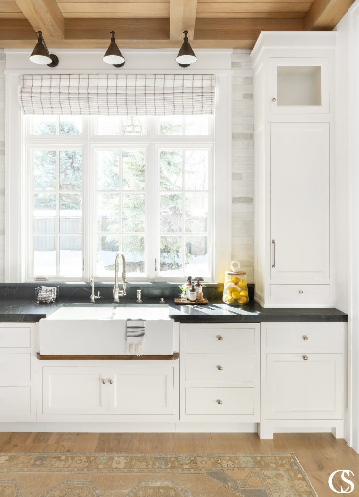 Love how this big kitchen window sheds plenty of light on the custom kitchen cabinet design. And with the addition of the beautiful installed lighting, these inset cabinets will be on display no matter the time of day.